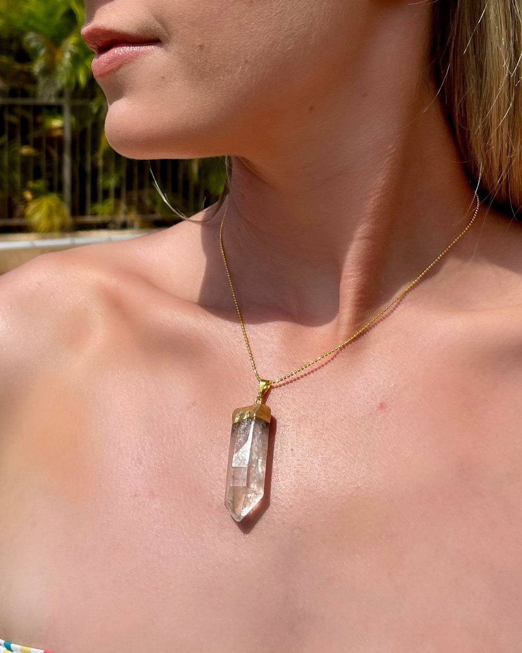 Quartz crystal store pendant